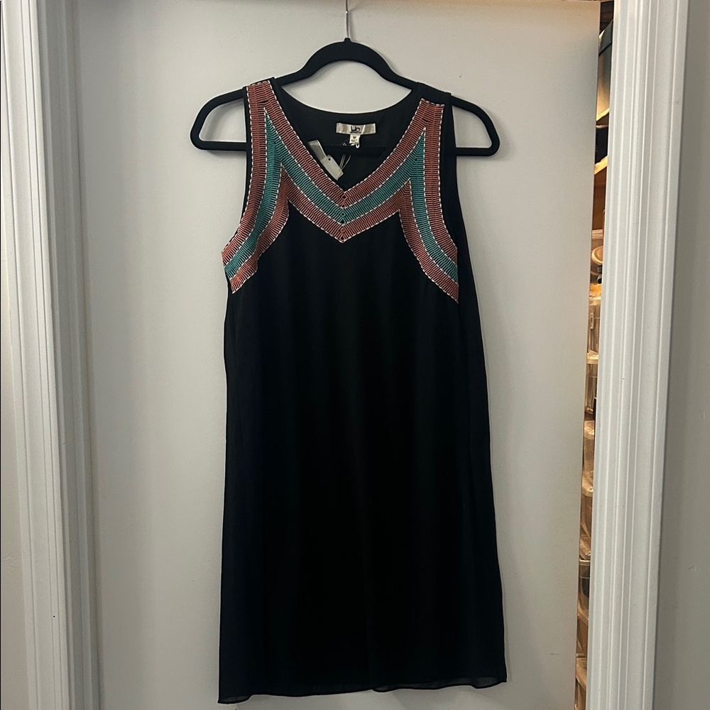 NWT Black Sleeveless dress with embroidered Design